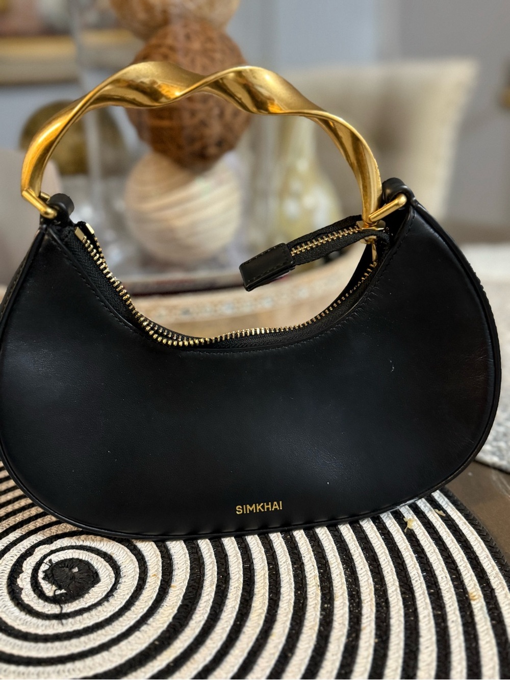 SIMKHAI Black Mini Crescent Bag with Sculpted Gold Handle